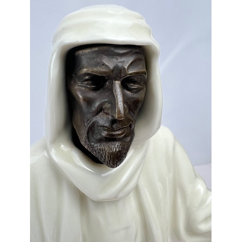 18 - A MINTON FIGURINE “THE SHEIKH”, DATED 1978

An Arab figurine with face, hands and falcon in bronze

... 