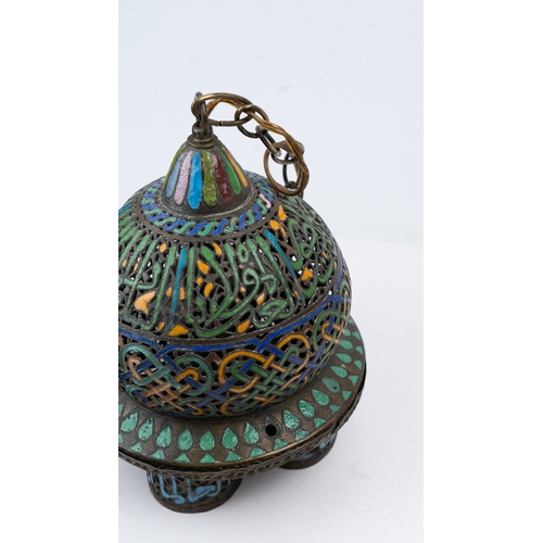 25 - AN ENAMELLED  BRONZE LAMP, ANDALUSIA, LATE 19TH CENTURY
Of globular form, standing on four cylindric... 