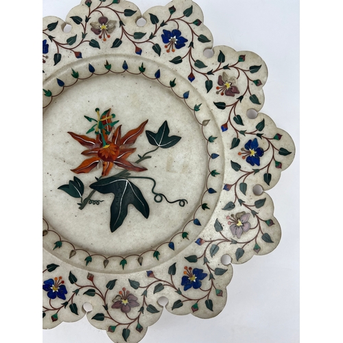 27 - A PIETRA DURA STONE INLAID MARBKE DISH, INDIA

Of flower form, a fine inlaid marble Pietra Dura dish... 