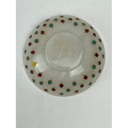 29 - A MUGHAL STYLE GEM INSET JADE BOWL, INDIA

Of deep rounded form, resting on a short circular foot, e... 