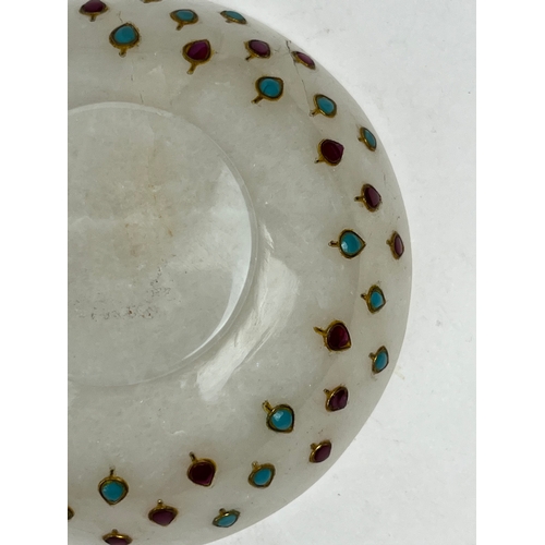 29 - A MUGHAL STYLE GEM INSET JADE BOWL, INDIA

Of deep rounded form, resting on a short circular foot, e... 