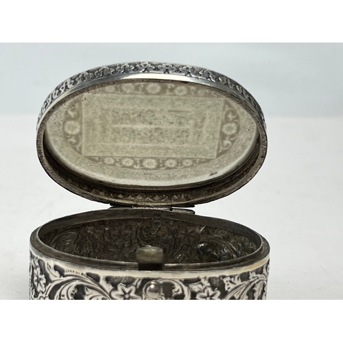 33 - AN INDIAN REPOUSSÈ SILVER BOX WITH ENGRAVED AGATE LID
POSSIBLY KUTCH, GUJARAT, INDIA, 19TH CENTURY

... 