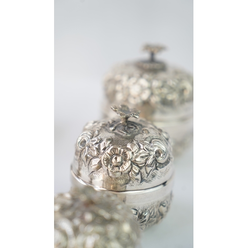 57 - A SET OF SIX SILVER ORNAMENTS
THREE SILVER ROSE WATER SPRINKLER

Of globular form, rising to a narro... 