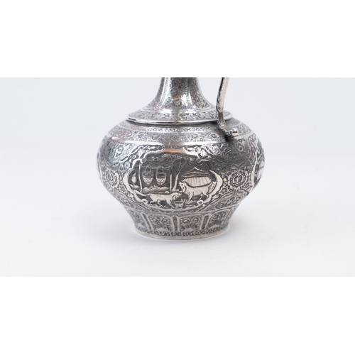 65 - A MID-20TH CENTURY PERSIAN SILVER EWER, ISFAHAN, CIRCA 1940
MARKED MAHMUD, PAHLAVI DYNASTY
The compr... 