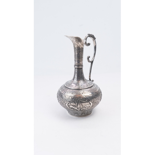 65 - A MID-20TH CENTURY PERSIAN SILVER EWER, ISFAHAN, CIRCA 1940
MARKED MAHMUD, PAHLAVI DYNASTY
The compr... 