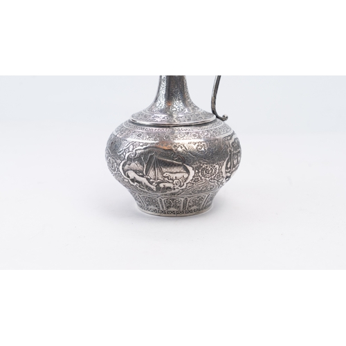 65 - A MID-20TH CENTURY PERSIAN SILVER EWER, ISFAHAN, CIRCA 1940
MARKED MAHMUD, PAHLAVI DYNASTY
The compr... 