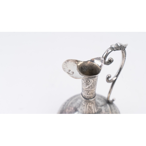 65 - A MID-20TH CENTURY PERSIAN SILVER EWER, ISFAHAN, CIRCA 1940
MARKED MAHMUD, PAHLAVI DYNASTY
The compr... 