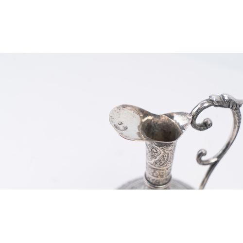 65 - A MID-20TH CENTURY PERSIAN SILVER EWER, ISFAHAN, CIRCA 1940
MARKED MAHMUD, PAHLAVI DYNASTY
The compr... 