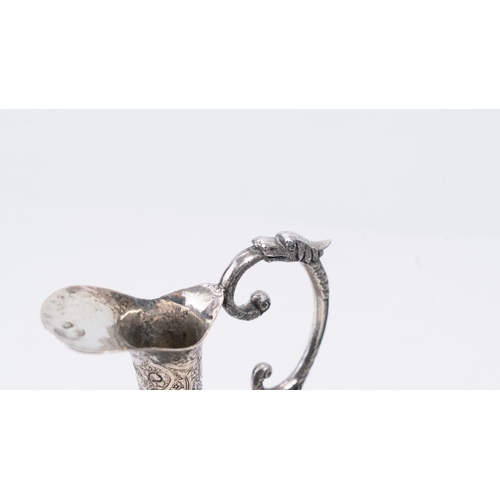 65 - A MID-20TH CENTURY PERSIAN SILVER EWER, ISFAHAN, CIRCA 1940
MARKED MAHMUD, PAHLAVI DYNASTY
The compr... 