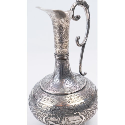 65 - A MID-20TH CENTURY PERSIAN SILVER EWER, ISFAHAN, CIRCA 1940
MARKED MAHMUD, PAHLAVI DYNASTY
The compr... 