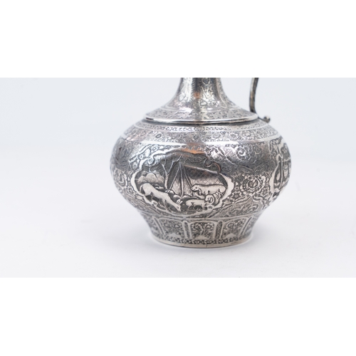 65 - A MID-20TH CENTURY PERSIAN SILVER EWER, ISFAHAN, CIRCA 1940
MARKED MAHMUD, PAHLAVI DYNASTY
The compr... 