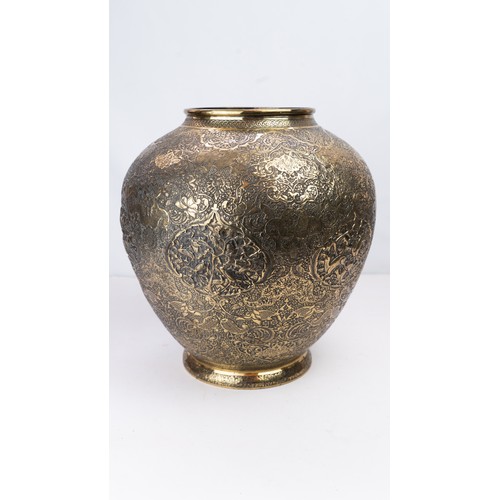 104 - FINELY ENGRAVED BRASS VASE OF BULBOUS FORM, EARLY 20TH CENTURY 
Of elegant bulbous form, resting on ... 