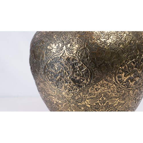 104 - FINELY ENGRAVED BRASS VASE OF BULBOUS FORM, EARLY 20TH CENTURY 
Of elegant bulbous form, resting on ... 