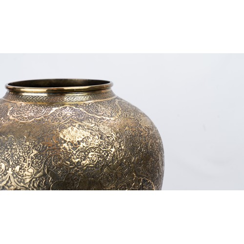 104 - FINELY ENGRAVED BRASS VASE OF BULBOUS FORM, EARLY 20TH CENTURY 
Of elegant bulbous form, resting on ... 