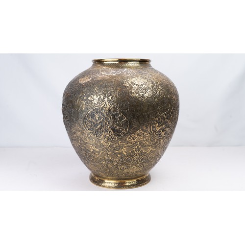 104 - FINELY ENGRAVED BRASS VASE OF BULBOUS FORM, EARLY 20TH CENTURY 
Of elegant bulbous form, resting on ... 