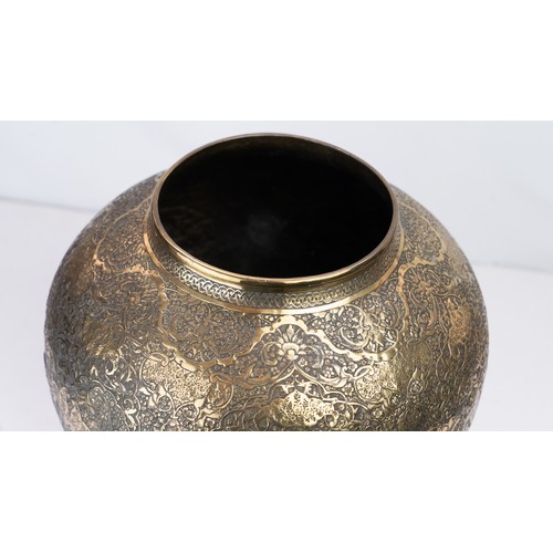 104 - FINELY ENGRAVED BRASS VASE OF BULBOUS FORM, EARLY 20TH CENTURY 
Of elegant bulbous form, resting on ... 