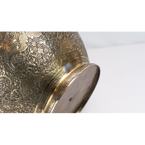 104 - FINELY ENGRAVED BRASS VASE OF BULBOUS FORM, EARLY 20TH CENTURY 
Of elegant bulbous form, resting on ... 