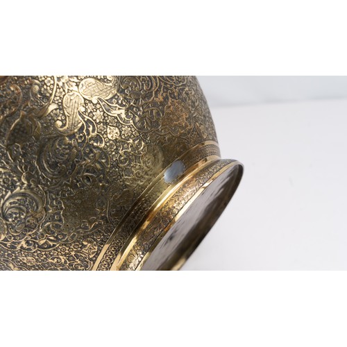 104 - FINELY ENGRAVED BRASS VASE OF BULBOUS FORM, EARLY 20TH CENTURY 
Of elegant bulbous form, resting on ... 