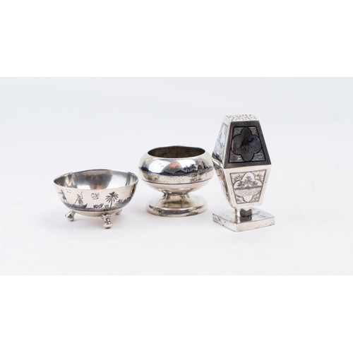 85 - EARLY 20TH CENTURY IRAQI SILVER AND NIELLO OBJECTS
Of compressed circular form, raised on a pedestal... 