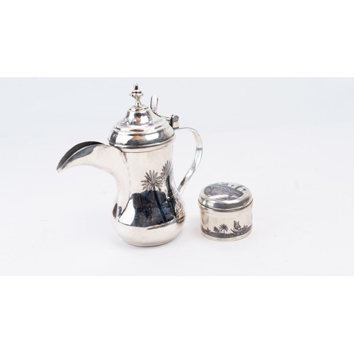 83 - A MID-20TH CENTURY IRAQI SILVER DALLAH COFFEE POT, OMARA OR BASRA, CIRCA 1950.   AN EARLY 20TH CENTU... 