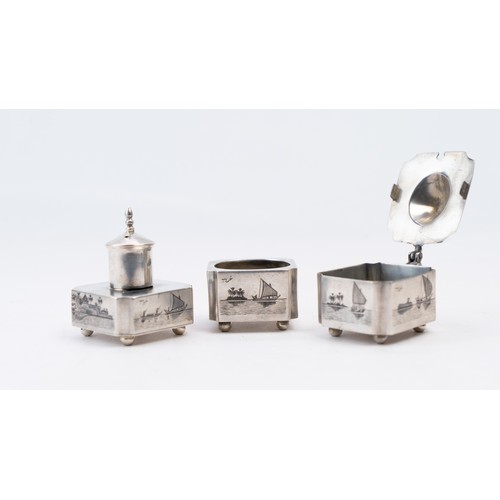 82 - AN EARLY 20TH CENTURY IRAQI SILVER AND NIELLO THREE-PIECE CRUET SET, OMARA, CIRCA 1930
SIGNED GHAREE... 