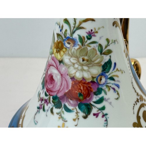 10 - A LATE MEISSEN PORCELAIN EWER,  
A fine porcelain ewer of bulbous form, elegantly poised on a splaye... 