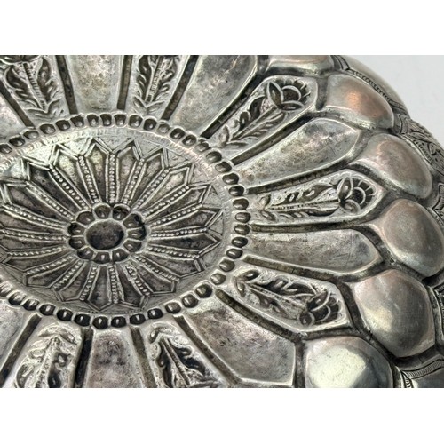 71 - A FINE PERSIAN SILVER BOWL QAJAR PERIOD, LATE 19TH CENTURY
Of lobed circular form with flaring rim, ... 