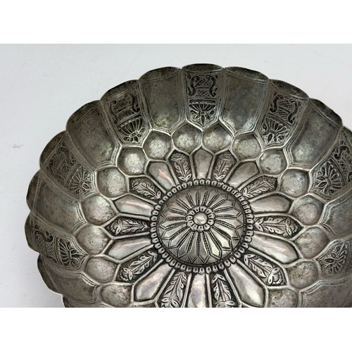 71 - A FINE PERSIAN SILVER BOWL QAJAR PERIOD, LATE 19TH CENTURY
Of lobed circular form with flaring rim, ... 