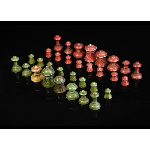 28 - AN INDIAN CHESS SET FOR MUSLIM MARKET, late 19th CENTURY 

A set of chess pieces with ‘Muslim’ patte... 