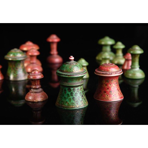 28 - AN INDIAN CHESS SET FOR MUSLIM MARKET, late 19th CENTURY 

A set of chess pieces with ‘Muslim’ patte... 