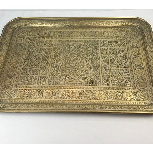 106 - DECORATIVE BRASS TRAY, 2OTH CENTURY

Of rectangular form, with rounded corners, featuring an intrica... 