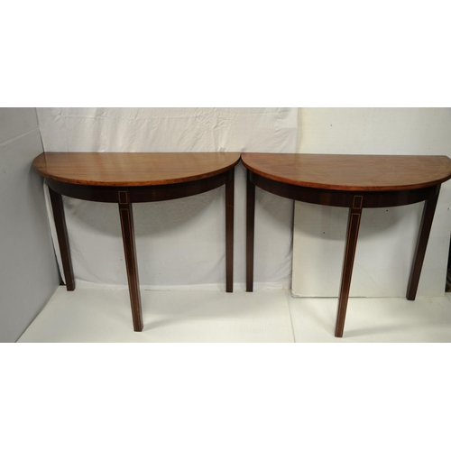 193 - Pair of inlaid mahogany demi-lune side tables on tapered legs (38