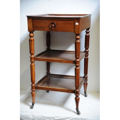 206 - Edwardian mahogany three-tier what-not with fitted drawer & cane shelves on turned legs (29