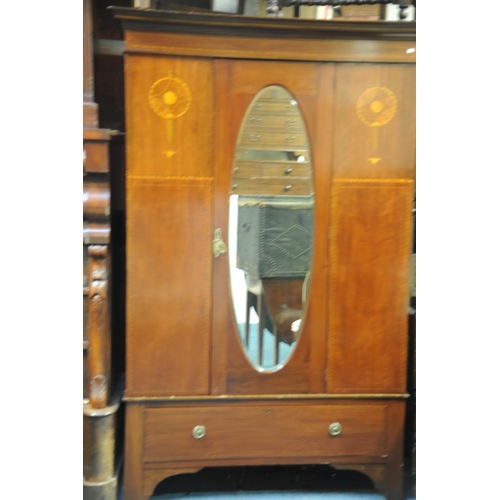 211 - Edwardian inlaid mahogany oval mirrored door wardrobe fitted with drawer (79
