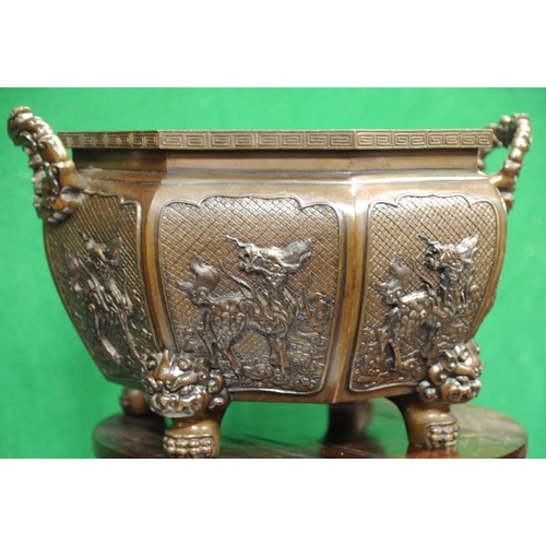 224 - Oriental octagonal two-handled bronze jardinière surmounted by dragons (11