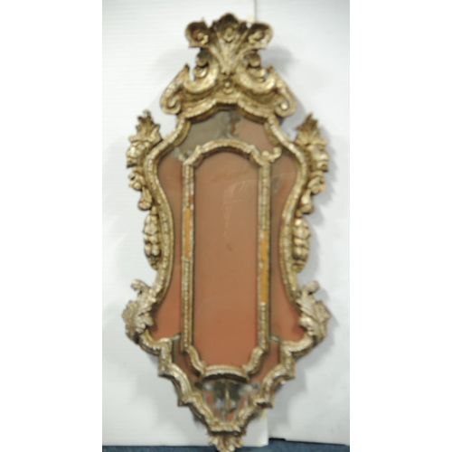 239 - Heavily carved gilt wall mirror 38