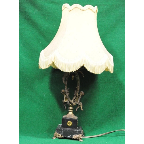 119 - Brass and Marble Table Lamp surmounted with Putties. (20