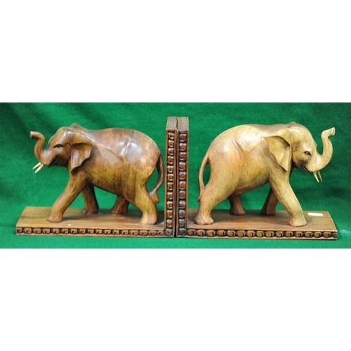 121 - Pair of carved Elephant Book Ends.