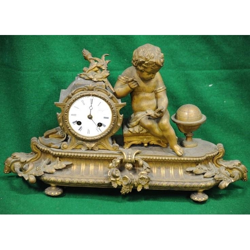 154 - French Brass mantel Clock surmounted by Boy with Tablet.