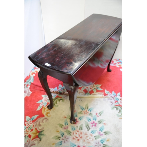 247 - Georgian Mahogany drop leaf Table on pad feet.                       (45