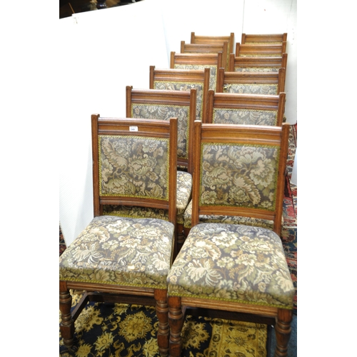 249 - Set of 12 Edwardian Oak upholstered Diningroom Chairs on turned and sabre legs.