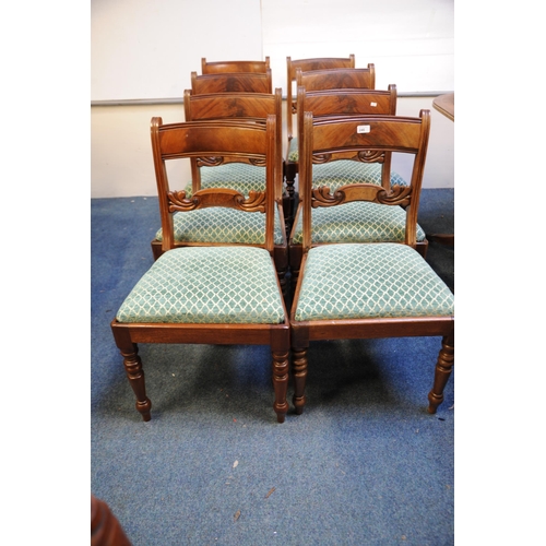 255 - Set of 8 Regency Mahogany green upholstered Diningroom Chairs on turned and sabre legs.