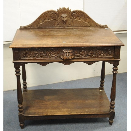 80 - Victorian carved Oak two tier Hall Table fitted with drawer.