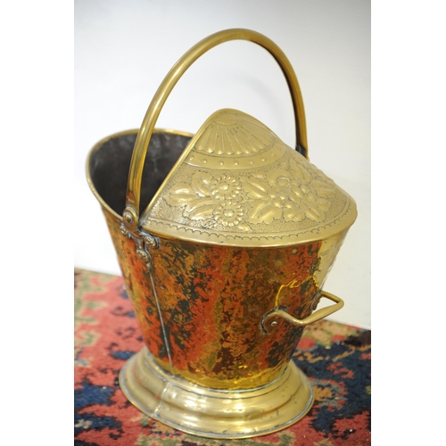 96 - A brass embossed Coal Helmet (18