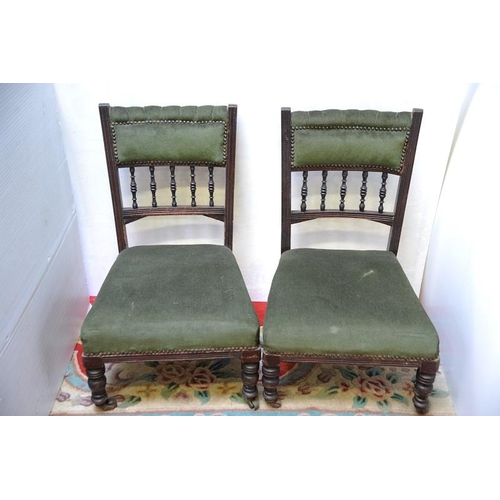 15 - Pair of Edwardian green upholstered Nursing Chairs.