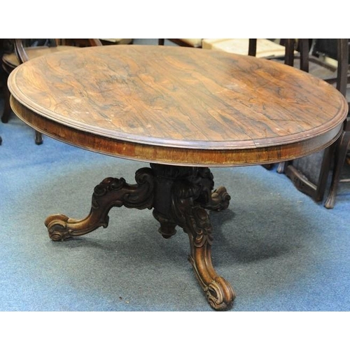 216 - Circular Rosewood Dining Table on carved baluster pod on three splayed legs.                  (52