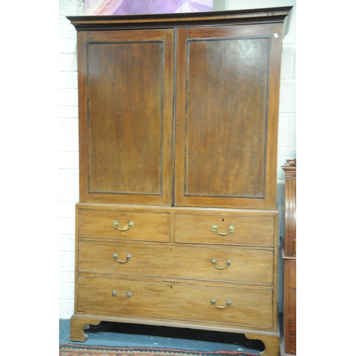 253 - Georgian inlaid Mahogany Linen Press fitted with 4 pull out drawers on bun feet.