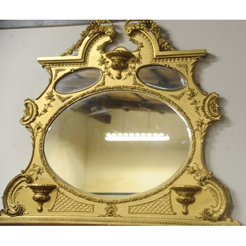 264 - Victorian Carved three panel Bevelled Glass Overmantle with Swan Neck Pediment.             (54