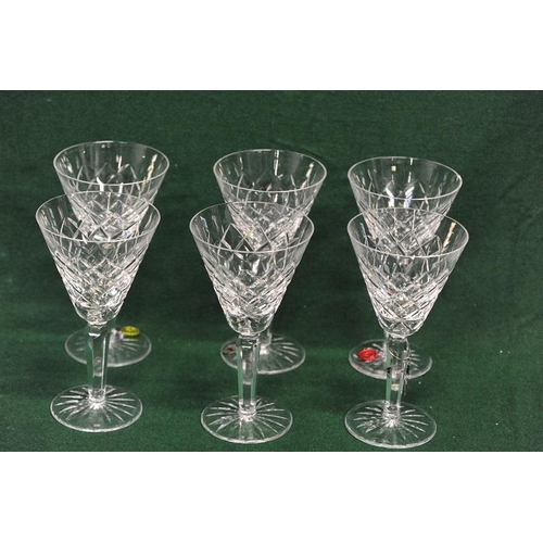 119 - Set of 6 Waterford Cut Glass long stemmed Wine Glasses (1 chipped)