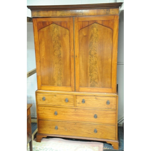 155 - Georgian Flame Mahogany Linen Press fitted with four drawers underneath on bracket feet